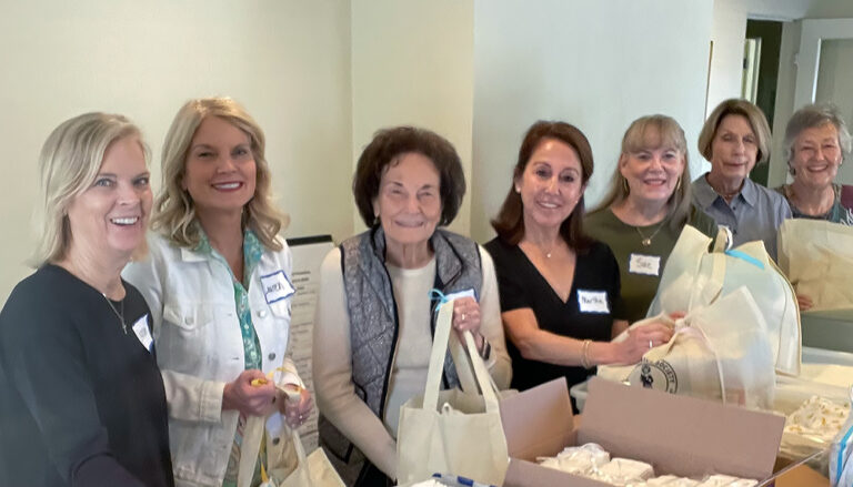 Christ Child Society of Pasadena assembling Layette sets